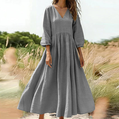 💃Női laza és kényelmes, V-nyakú, rakott hosszú ruha👗